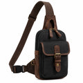Bolso bandolera 18 x 8 x 30 cm de tejido negro y detalles marrones con correa ajustable