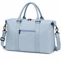Bolsa de viaje 45 x 20 x 30 cm de tejido sintético azul claro con correa ajustable